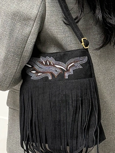 Vintage black suede crossbody bag with bird embroidery and long fringe details