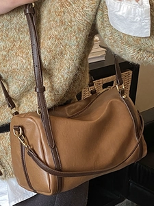 Vintage caramel brown Boston barrel bag with lychee pattern and adjustable strap for women