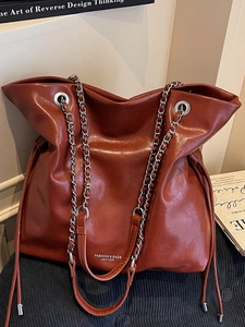 Vintage large capacity brown tote bag with metal chain strap and tassel detail for women