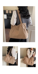 Detail view of khaki large tote bag featuring adjustable drawstring sides and fabric strap