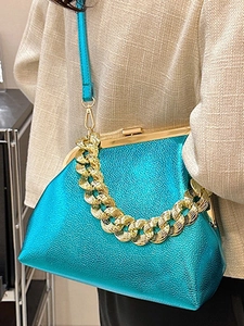 Metallic blue textured chain handbag with gold frame closure and crossbody strap