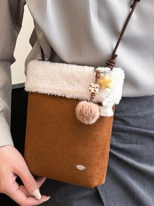 Winter brown suede crossbody bag with white faux fur trim and cute plush animal charms