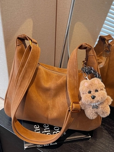 Brown frosted large capacity tote bag with wide strap and cute plush bear charm decoration