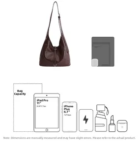 Detail view of large brown leather tote bag capacity showing 11 inch iPad Pro and iPhone