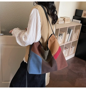 Close-up of color block tote bag with high capacity and matte texture for daily use