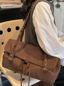 Vintage brown suede tote bag with woven shoulder straps and bow detail for women