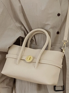 Cream lychee leather mini tote bag with gold twist lock and adjustable shoulder strap