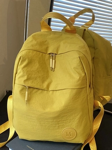 Sac à dos décontracté en nylon jaune gingembre avec logo M pour voyage et école