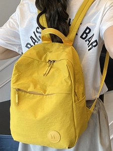 Sac à dos en nylon jaune vif à grande capacité avec poche zippée et bretelles réglables