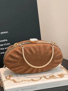 Elegant brown suede oval evening bag with crystal buckle and golden chain straps