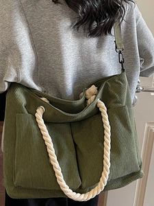 Olive green corduroy tote bag with rope handles and adjustable strap for women