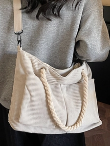 Large beige corduroy tote bag with rope handle and adjustable shoulder strap for women