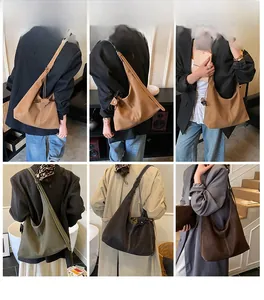 Vue en trois volets d'un grand sac hobo vintage avec des surpiqûres contrastées chic