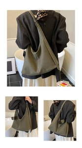 Vue détaillée du sac cabas vert olive avec coutures contrastées blanches et fini mat