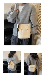 Detailed views of creamy white leather bucket bag featuring a brown braided charm and magnetic flap