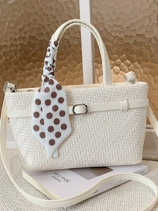 White woven handbag with polka dot scarf detail and crossbody strap for women
