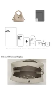 Internal view of beige bucket bag showing storage capacity and functional compartments