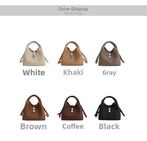 Detailed color options of the minimalist bucket bag with metal lock and pebble leather