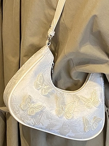 White crescent lace shoulder bag with elegant 3D butterfly embroidery details