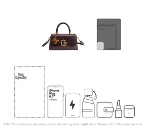 Macro view of a dark brown retro handbag showing capacity for phones and daily essentials