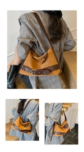 Texture détaillée du sac porté épaule en daim marron avec lanières et boucles argent