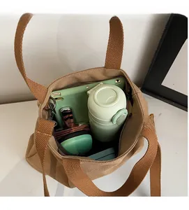 Detailed interior view of a large canvas tote bag showing spacious storage capacity