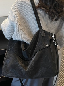 Large black bohemian tote bag with daisy embroidery and retro washed canvas texture