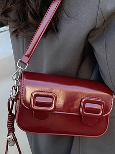 2025 trendy burgundy faux leather saddle bag for women with silver heart charm and strap