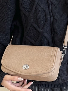 French style underarm bag in beige leather with silver twist lock and stitch detail
