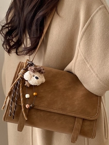 Retro brown suede crossbody messenger bag with cute plush puppy charm and flap design