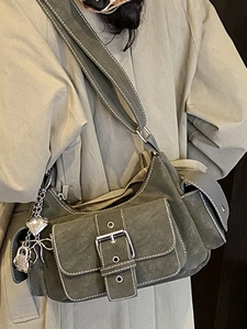Vintage green washed canvas shoulder bag with heart lock charm and white stitching
