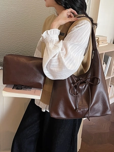 Minimalist coffee brown PU leather tote bag with bow detail and matching pouch for women