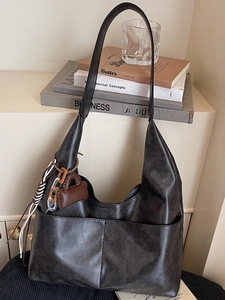 Vintage dark brown faux suede tote bag with wide strap and mini bag pendant