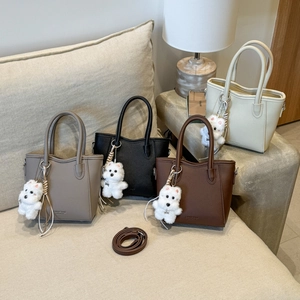Litchi pattern leather bucket bags in four colors with cute white puppy pendants