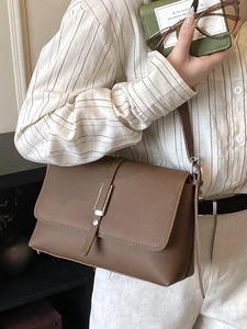 Vintage brown textured leather crossbody bag with silver metal bar flap for women