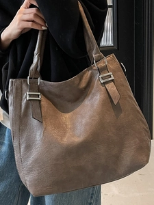 Chic dark brown wrinkled leather tote bag with silver buckles for casual daily use