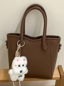 Deep brown litchi pattern leather bucket bag with top handle and cute puppy charm