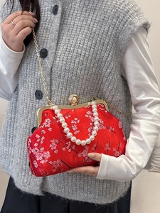 Elegant red Chinese style evening bag with floral embroidery and pearl handle strap