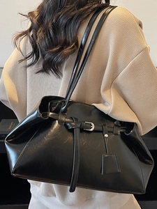 Minimalist black faux leather tote bag with decorative buckle and large capacity