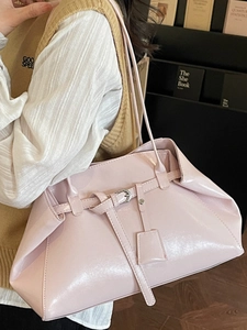 Minimalist light pink glossy tote bag for women with spacious design and shoulder straps