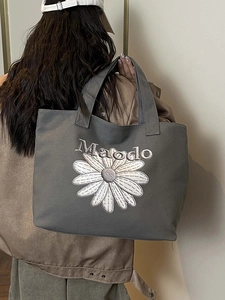 Sac cabas en toile grise avec broderie marguerite blanche et texte Maodo pour femme