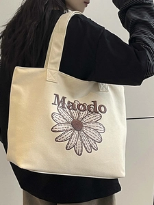 Sac fourre-tout minimaliste en toile beige avec grand imprimé marguerite et bandoulières
