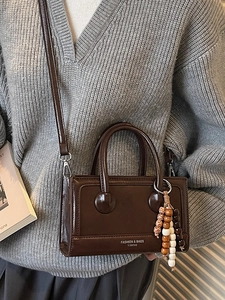 Deep brown vintage leather handbag with beads charm and detachable crossbody strap