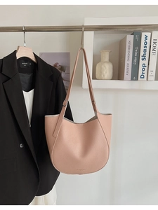 Pink lychee grain leather hobo tote bag featuring a minimalist semi-moon shape design