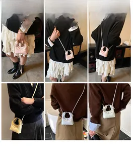 Detail shots of a fashion leather tote bag with elegant ruffle handle and chain accents