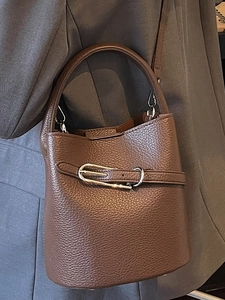 Vintage brown lychee grain leather bucket bag with silver metal buckle for women commuting