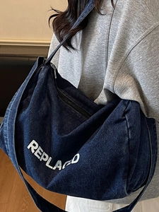 Deep blue denim large capacity tote bag with white lettering for stylish casual commute