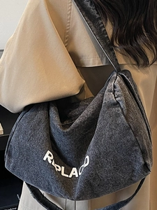 Large washed denim shoulder bag with REPLACED letter print for casual commuting wear