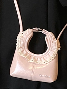 Chic pink mini cloud bag with glossy finish and delicate white lace trim for women