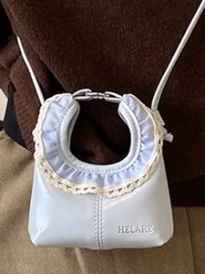 Minimalist light purple cloud handbag with elegant white lace trim and shoulder strap